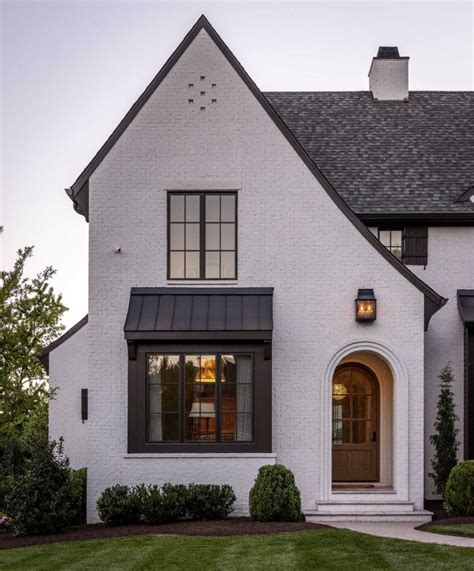 modernize tudor exterior|exterior tudor front doors.